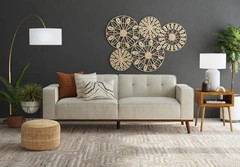The same cream sofa in an artist-designed living room